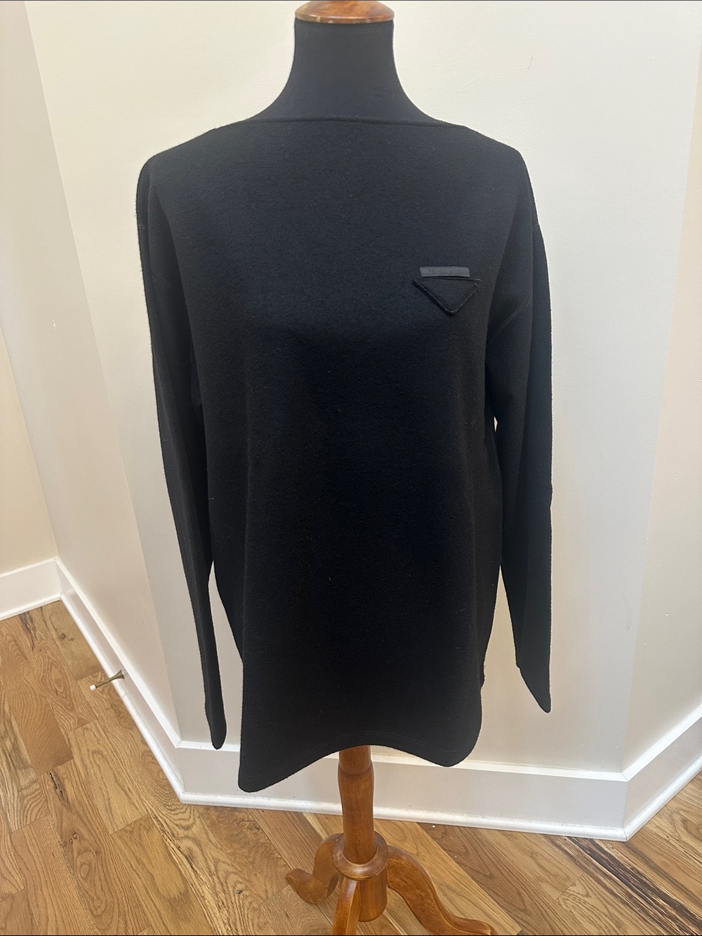 Prada Black Crewneck Virgin Wool Top with Subtle Triangle Emblem
